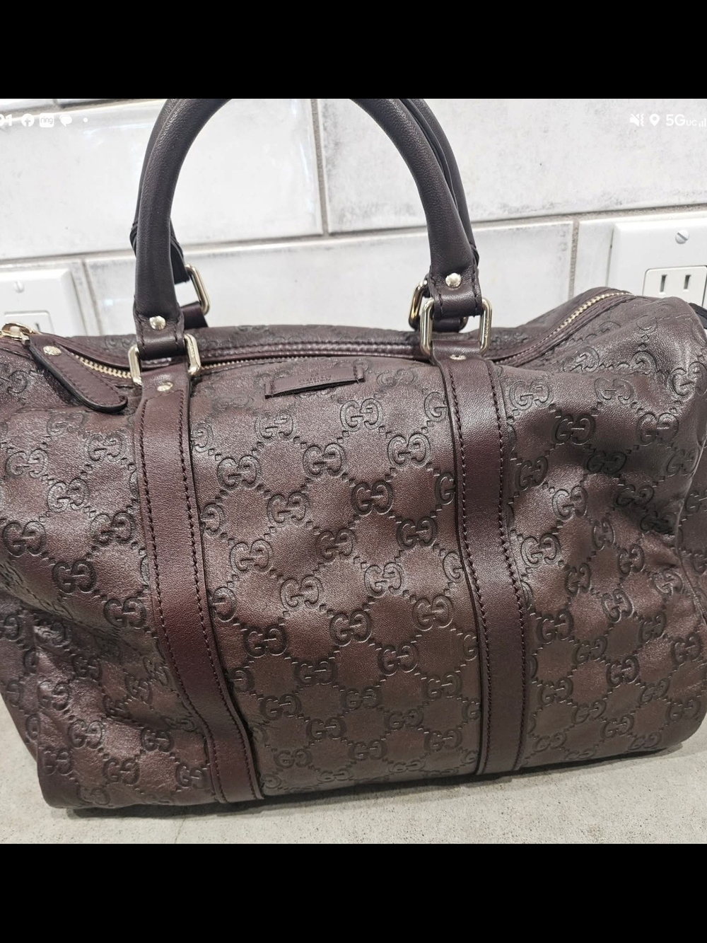 Gucci Embossed GG Leather Duffel Bag - Brown